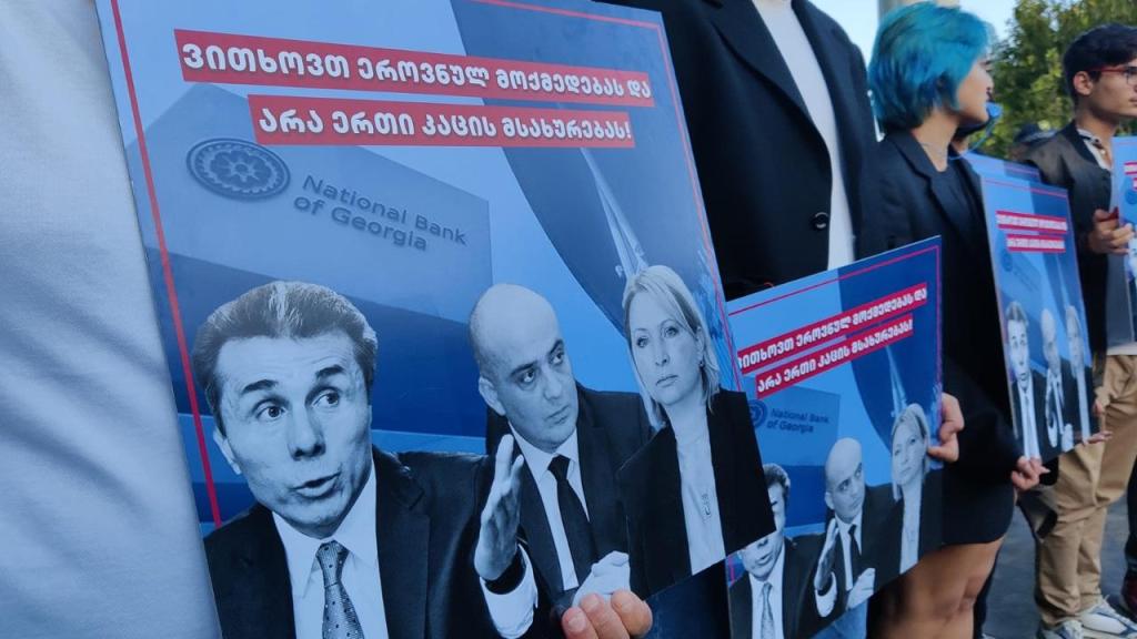GEORGIANS PROTEST NATIONAL BANK DECISION NOT TO APPLY WESTERN&nbsp;SANCTIONS